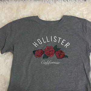 Grey crop top with white embroidery and graphic rose design